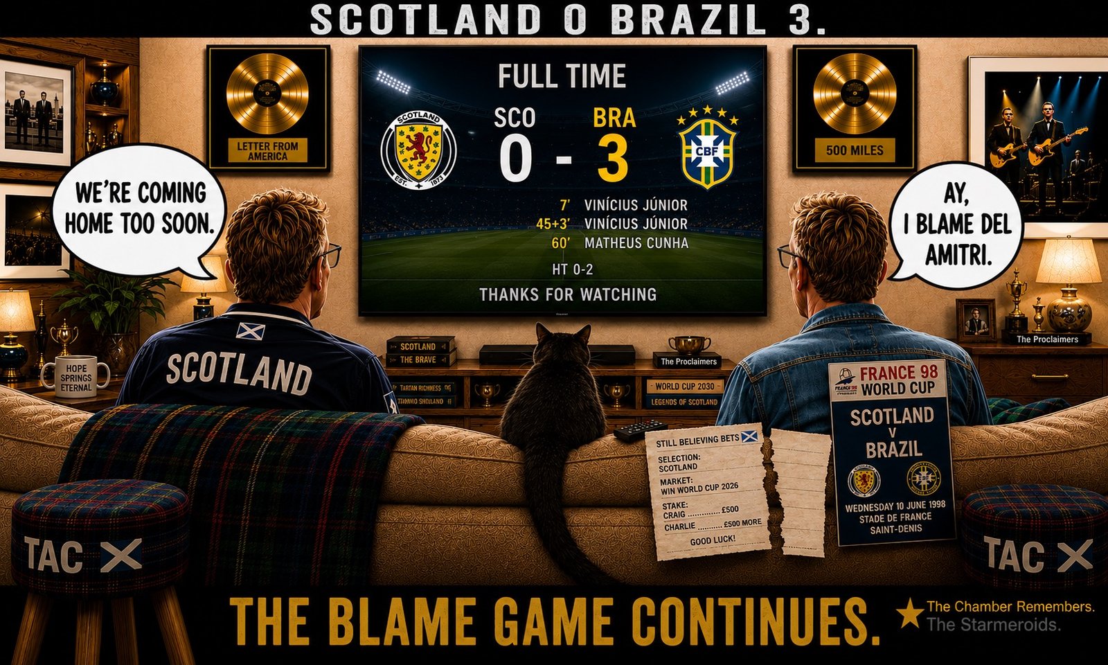 Top bar text: "SCOTLAND 0 BRAZIL 3." In the Scotland sofa room, Craig Reid sits on the left and Charlie Reid on the right, seen from behind with Tac between them facing the television. Craig says, "WE'RE COMING HOME TOO SOON." Charlie replies, "AY, I BLAME DEL AMITRI." The television shows full time, Scotland 0-3 Brazil, with two goals from Vinicius Junior and one from Matheus Cunha. Letter From America and 500 Miles gold discs hang on the wall. A STILL BELIEVING BETS slip backs Scotland to win the 2026 World Cup, and a programme is for Scotland v Brazil at the 1998 World Cup. Bottom bar text: "THE BLAME GAME CONTINUES."